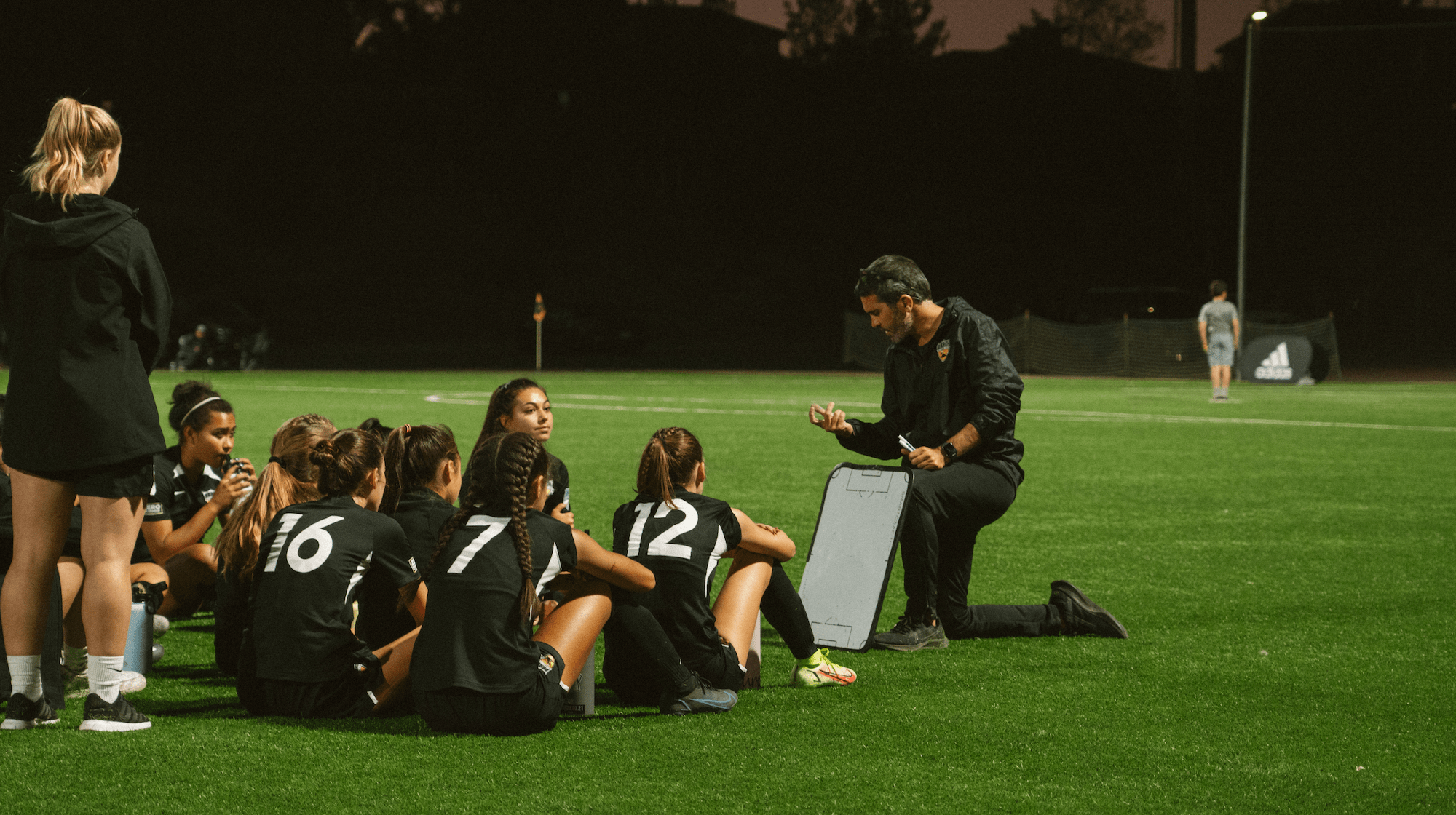 coach speaking to team